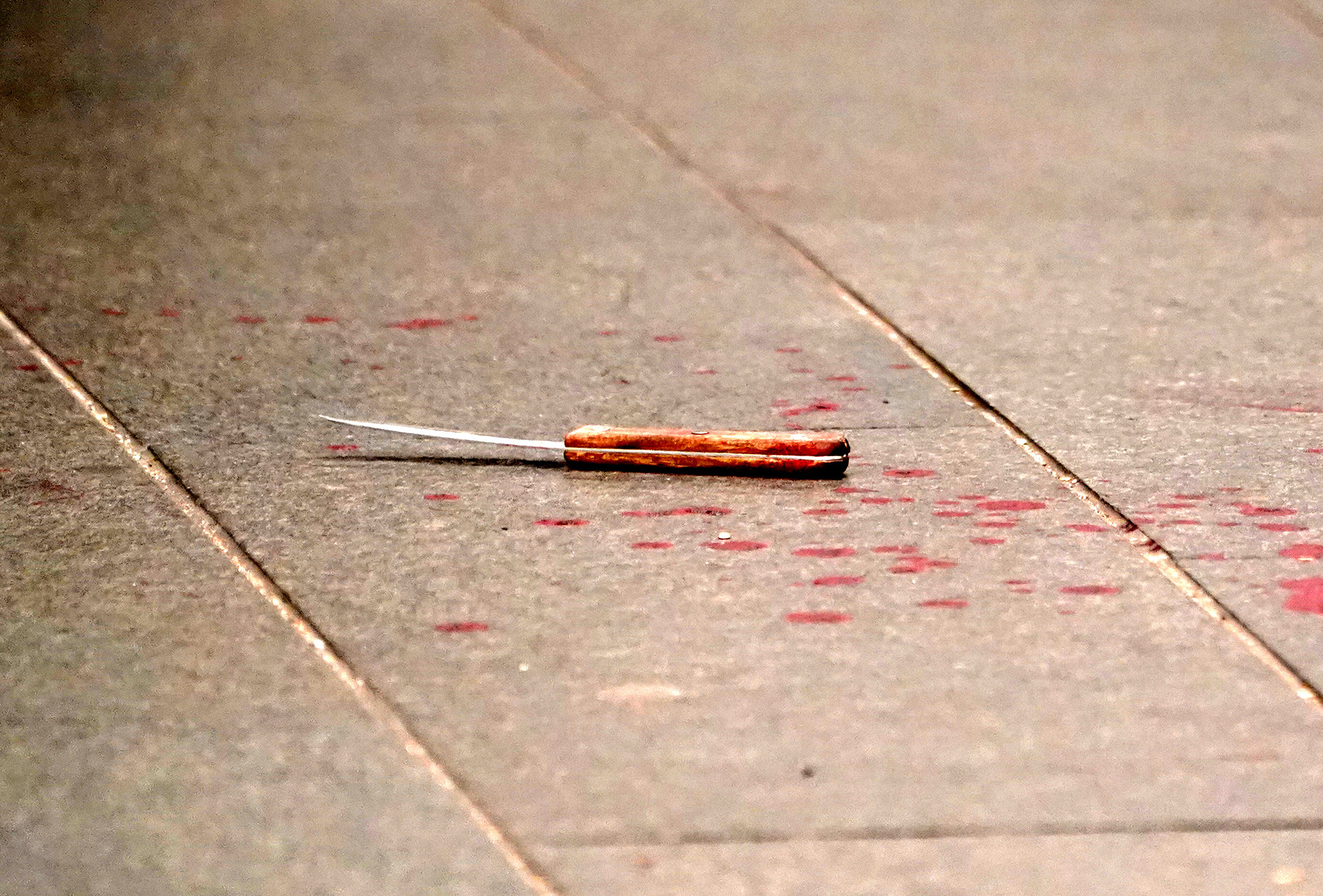 A bloody knife seen after the stabbing.