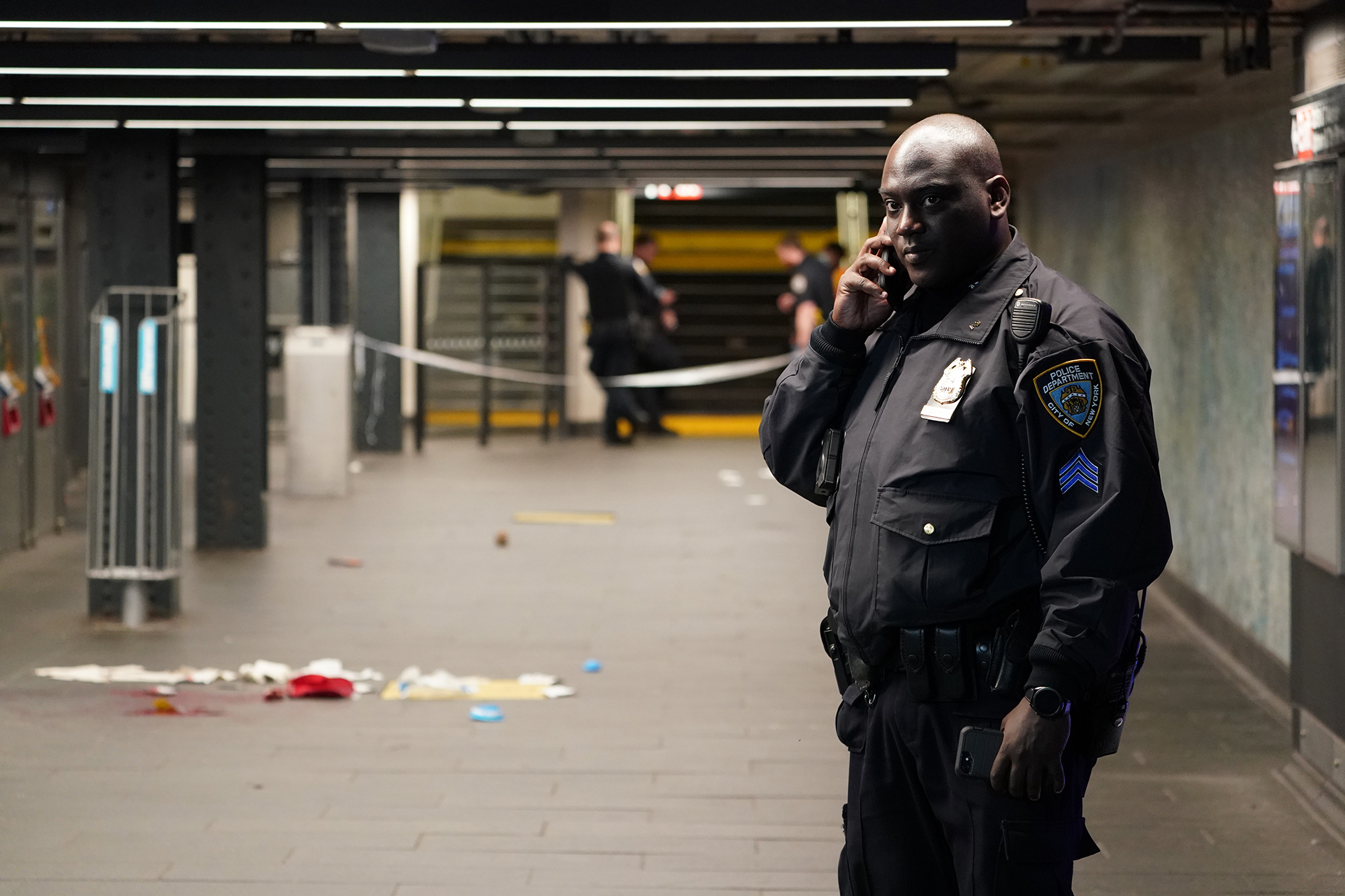 Police at the scene where a person was fatally stabbed inside the 34th Street subway station located at Seventh Avenue and W34th Street in New York.