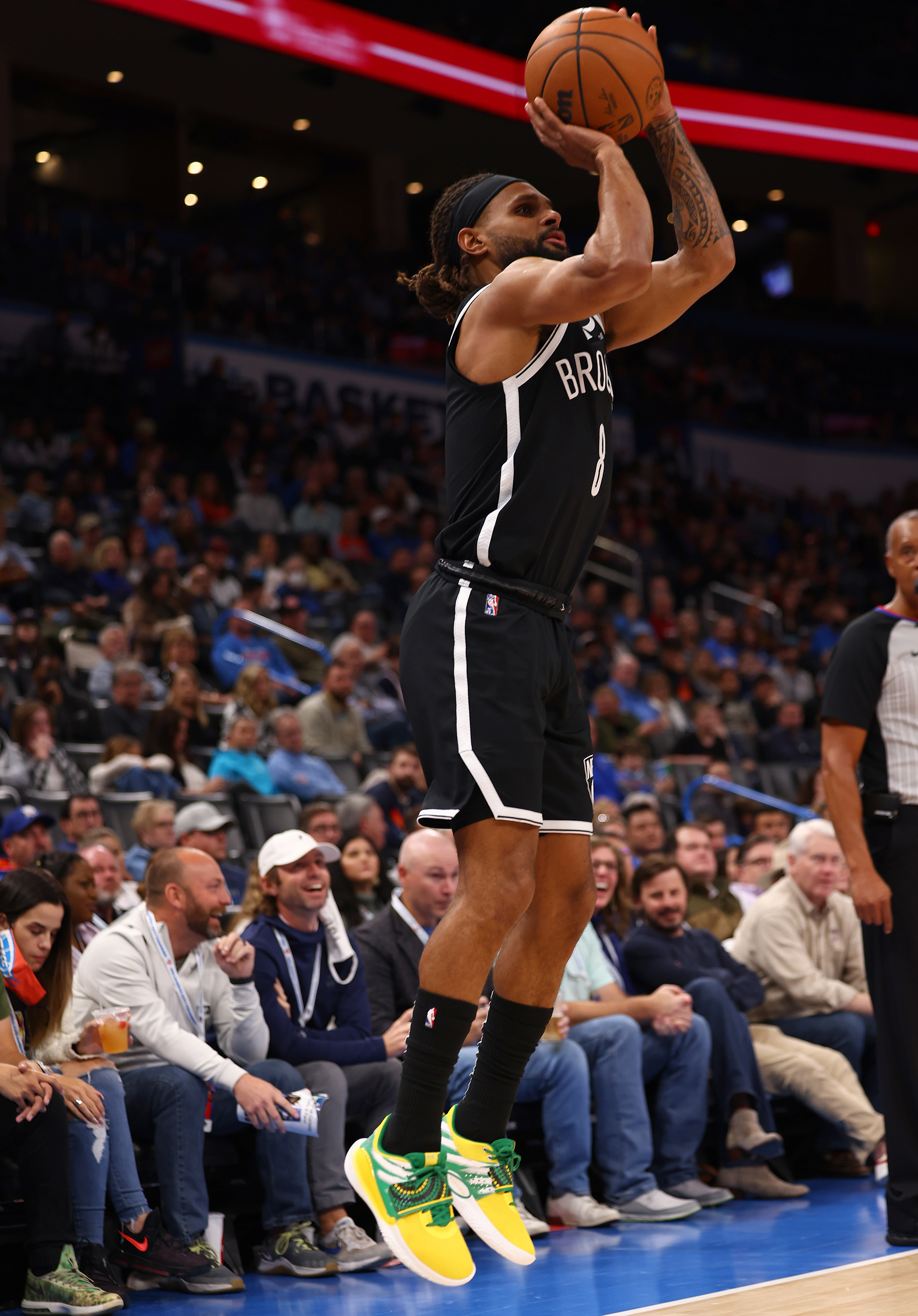 Patty Mills drills one of his nine three-pointers.