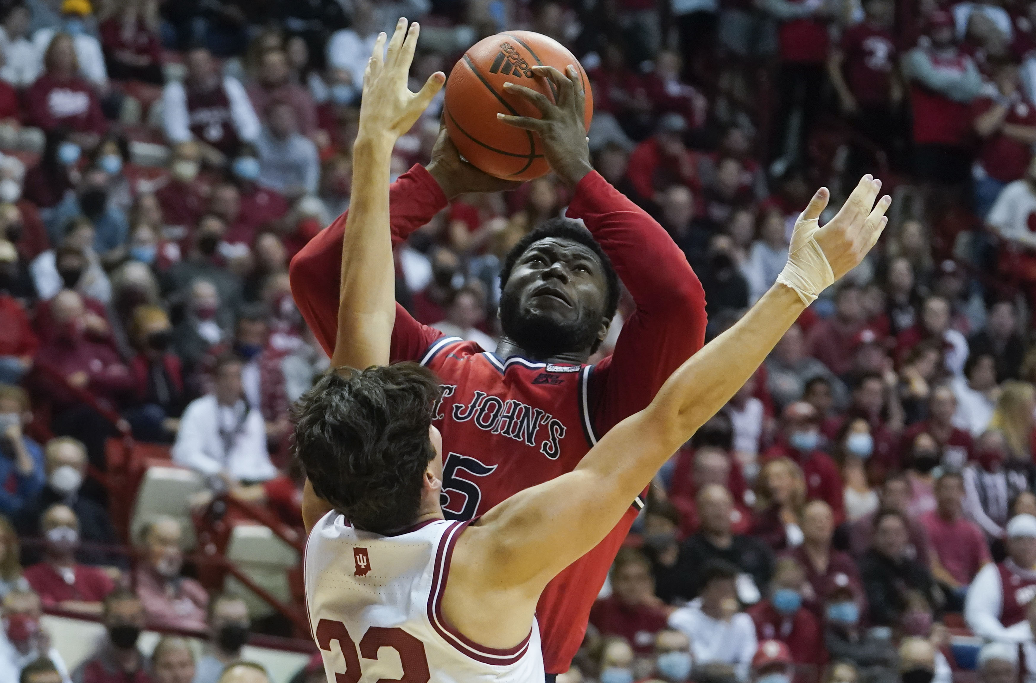 Dylan Addae-Wusu shoots over Indiana's Trey Galloway during St. John's loss.