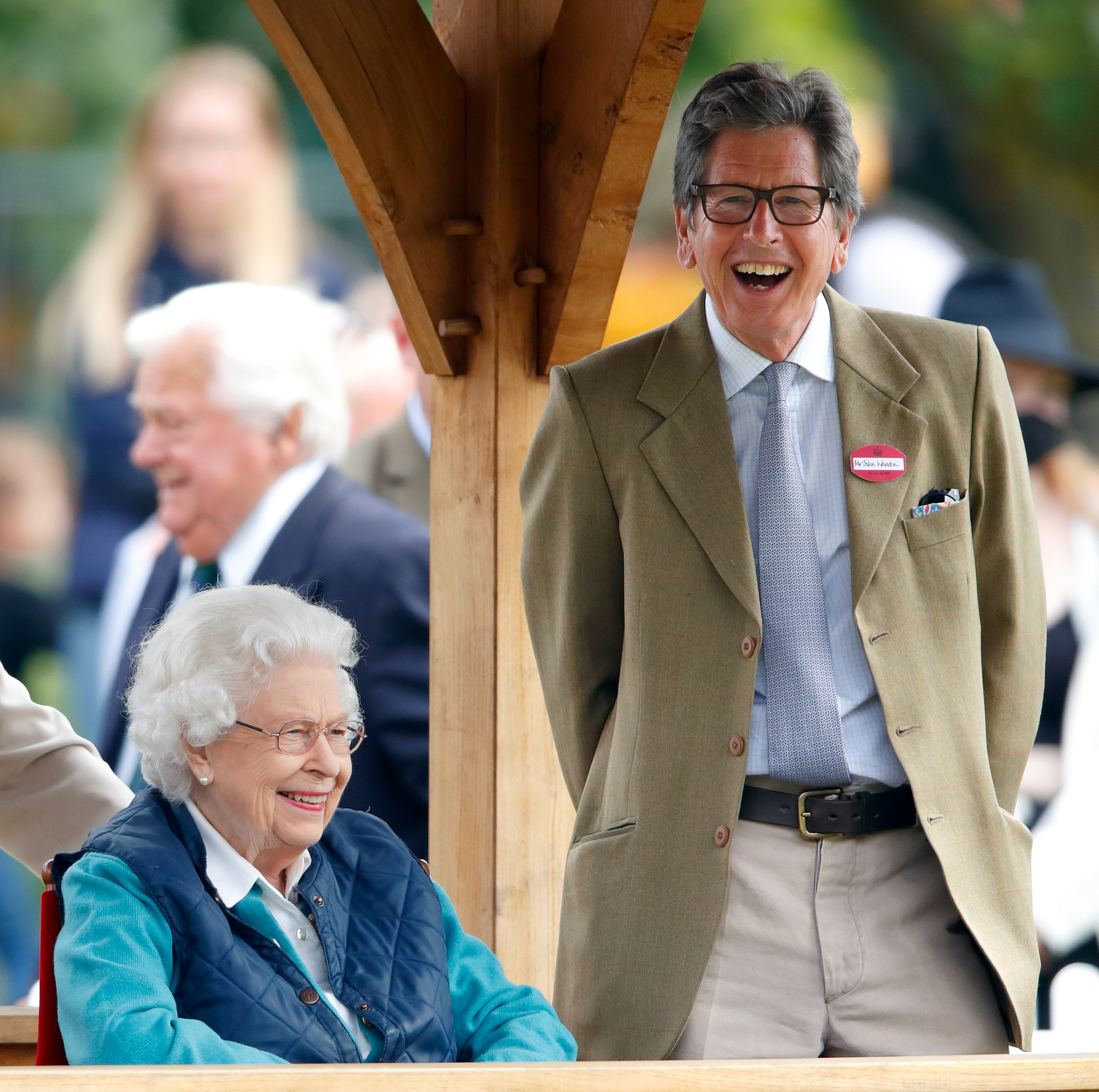 Queen Elizabeth II with her racing manager, John Warren.