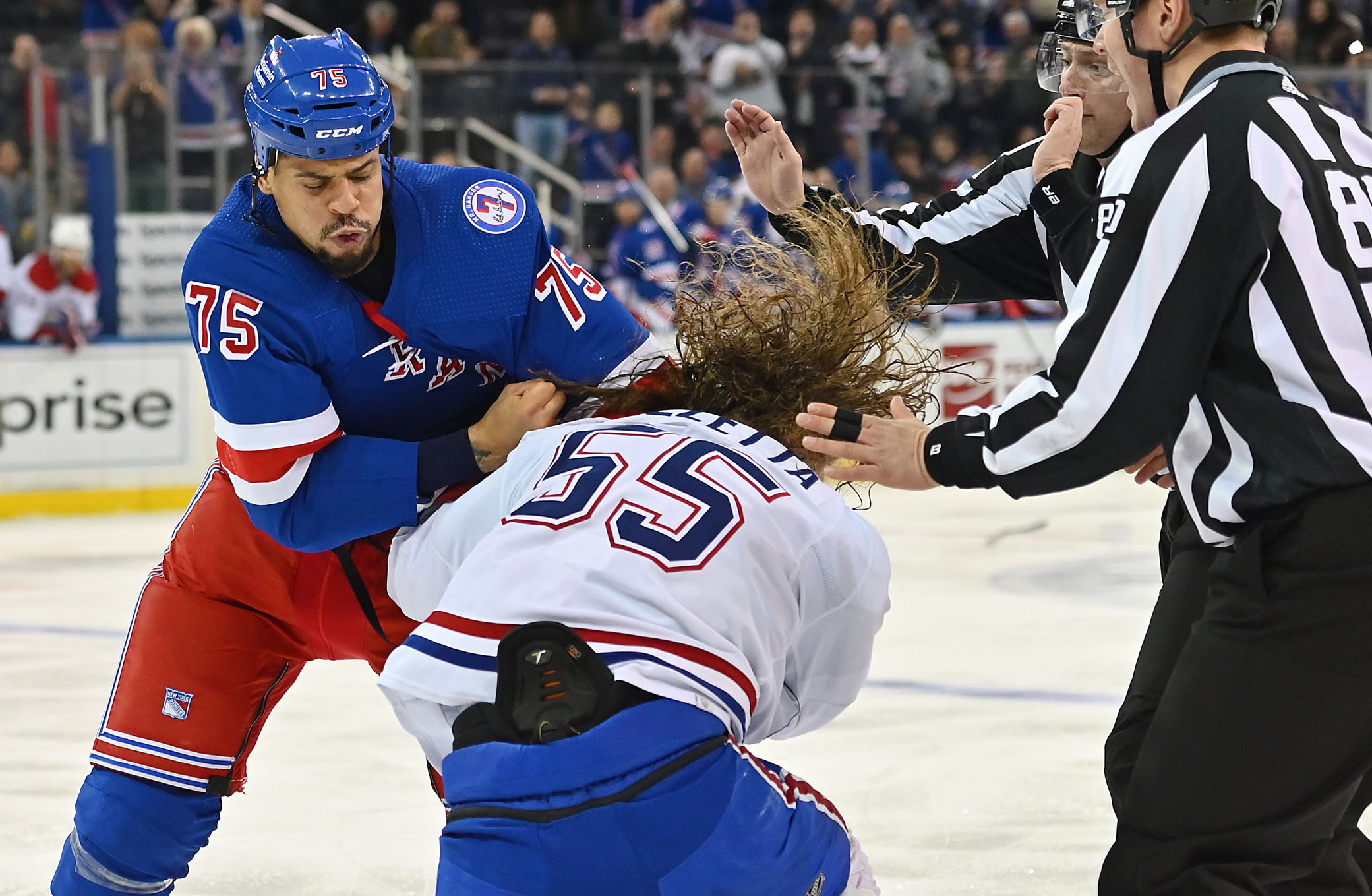 Ryan Reaves (left) fights Michael Pezzetta during the Rangers' 3-2 victory over Canadiens.