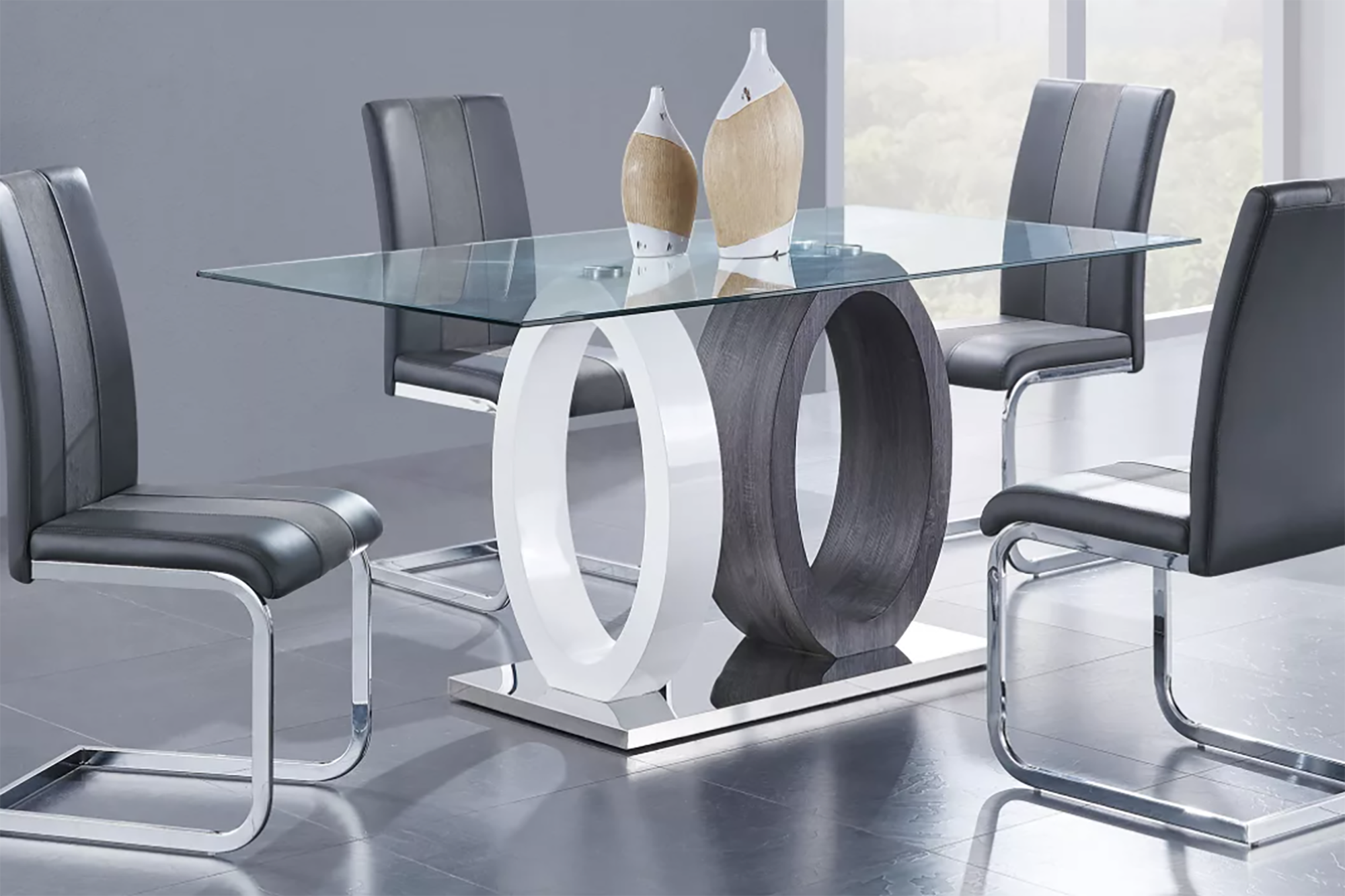 A modern silver dining room set up 