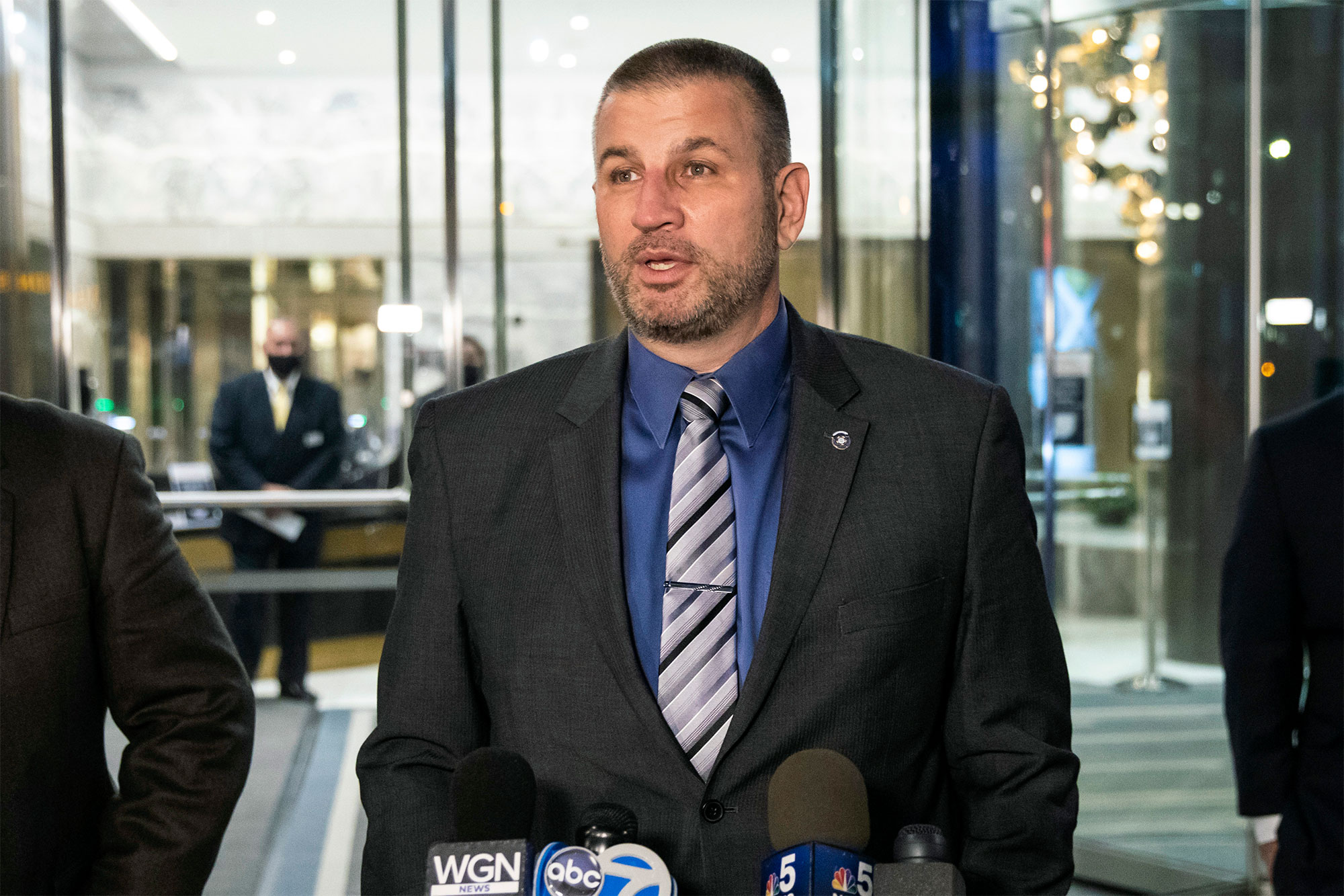 Fraternal Order of Police Lodge 7 President John Catanzara speaks to reporters as he walks out of a Chicago Police Board hearing in the Loop, Monday, Nov. 15, 2021.