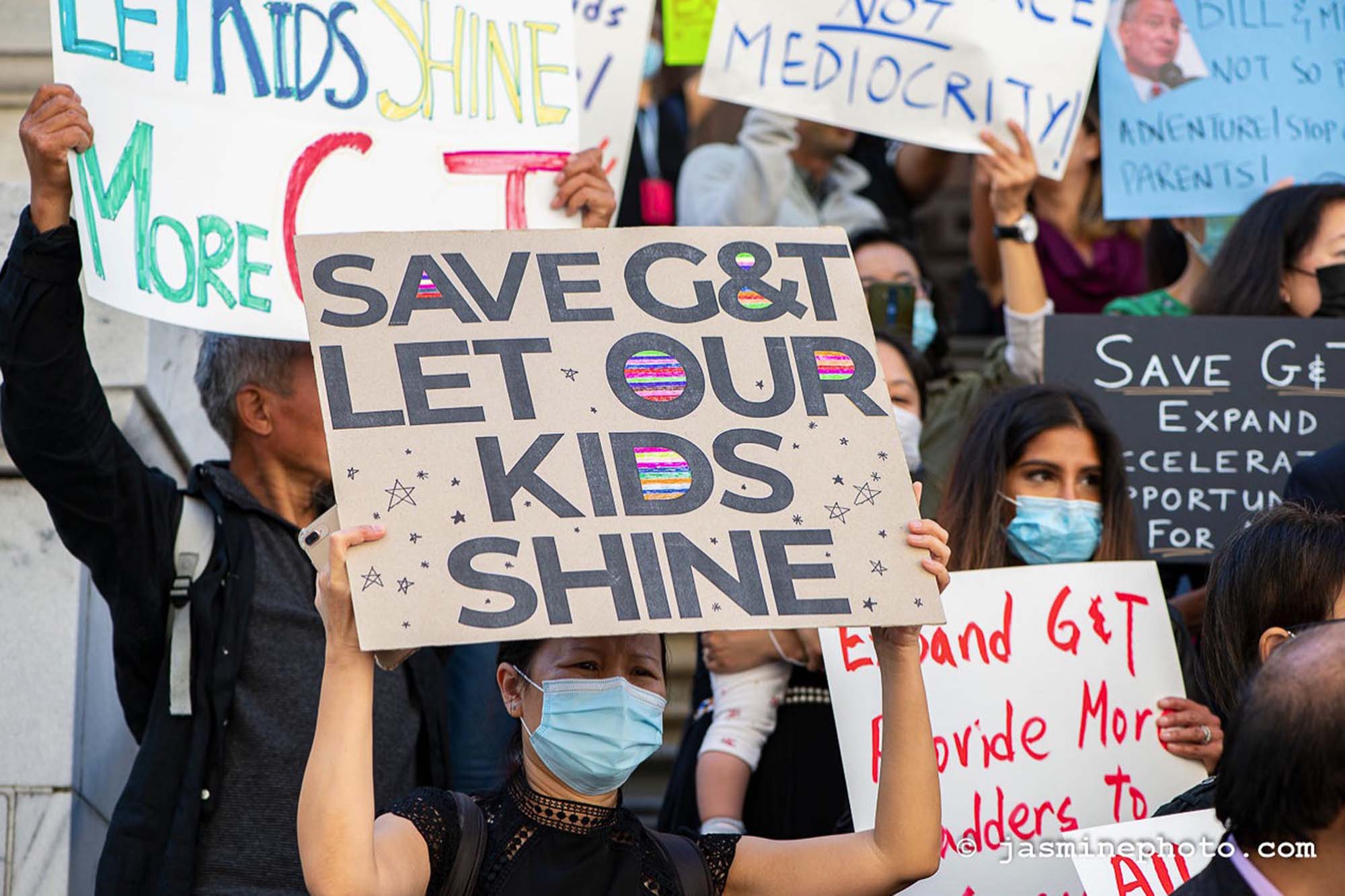 More than 200 supporters of the city’s Gifted and Talented program massed at Department of Education headquarters Thursday 