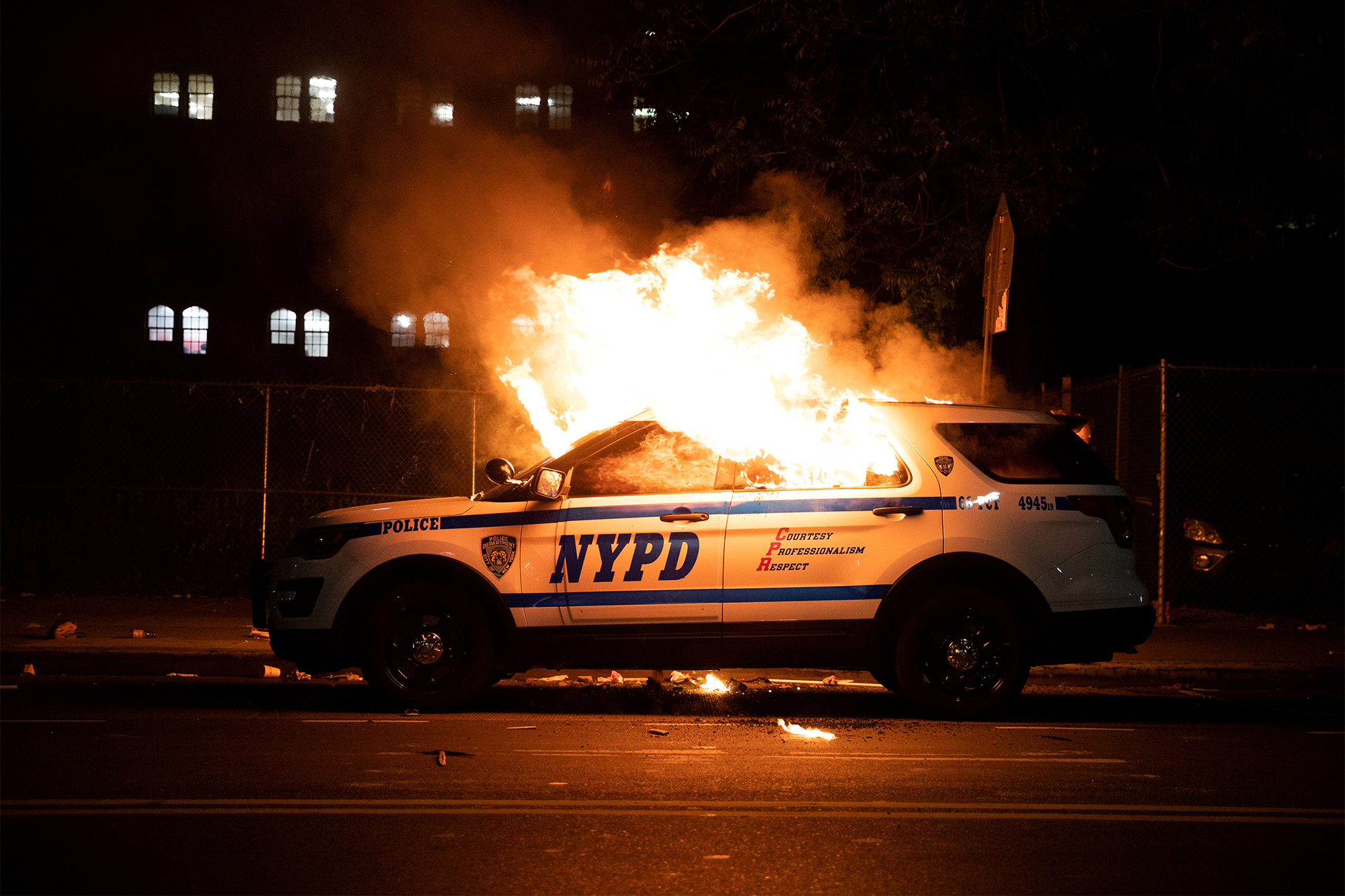 NYPD cop car on fire during protests