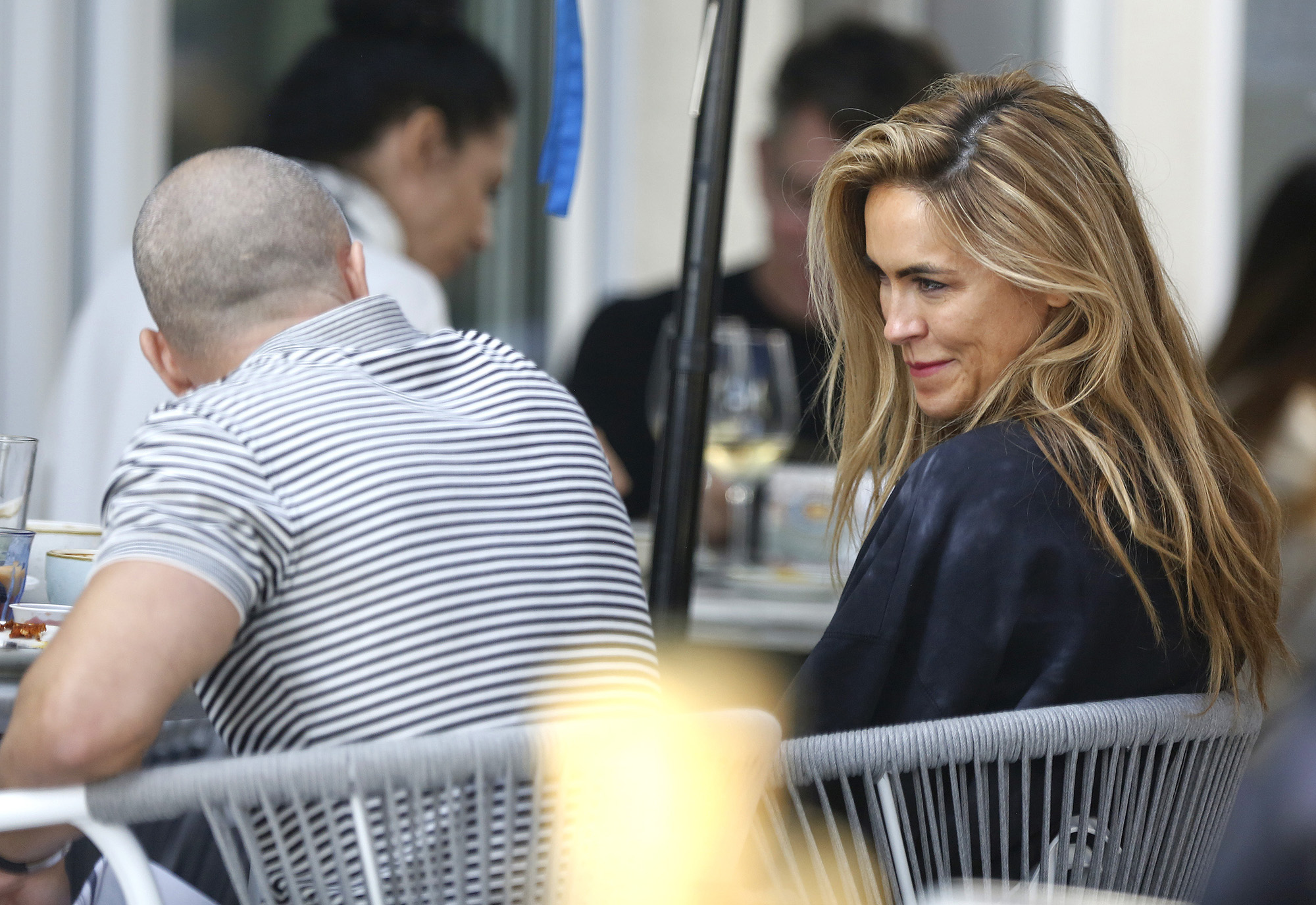 EXCLUSIVEPhoto Credit: MOVI Inc.  November 9th 2021Chrishell Stause and Jason Oppenheim loved up in L.A! The 'Selling Sunset' pair's relationship still seems to be going strong as the pair cuddle and kiss during an alfresco lunch in West Hollywood,C