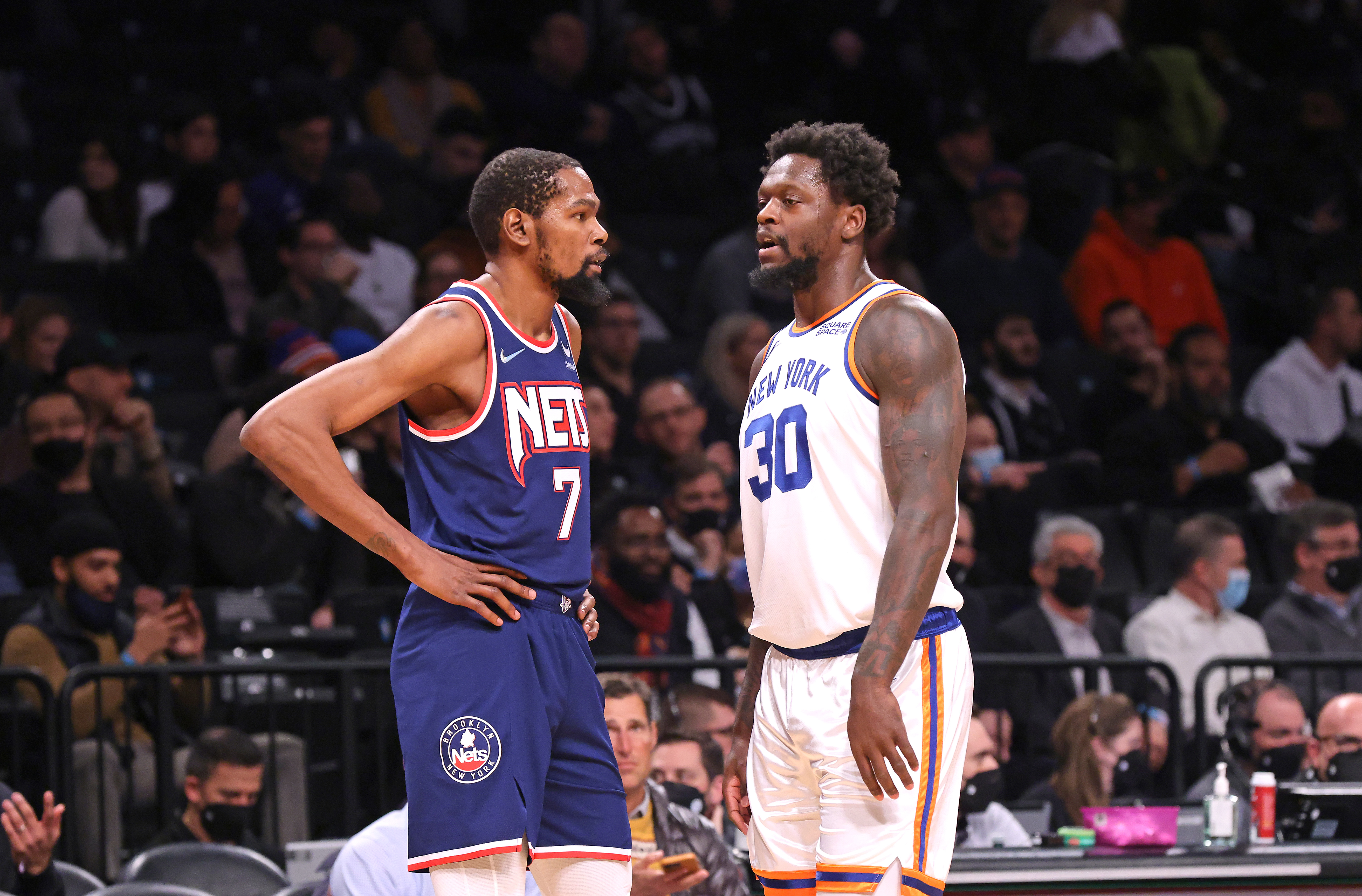 Kevin Durant and Julius Randle talk during a game at Madison Square Garden.