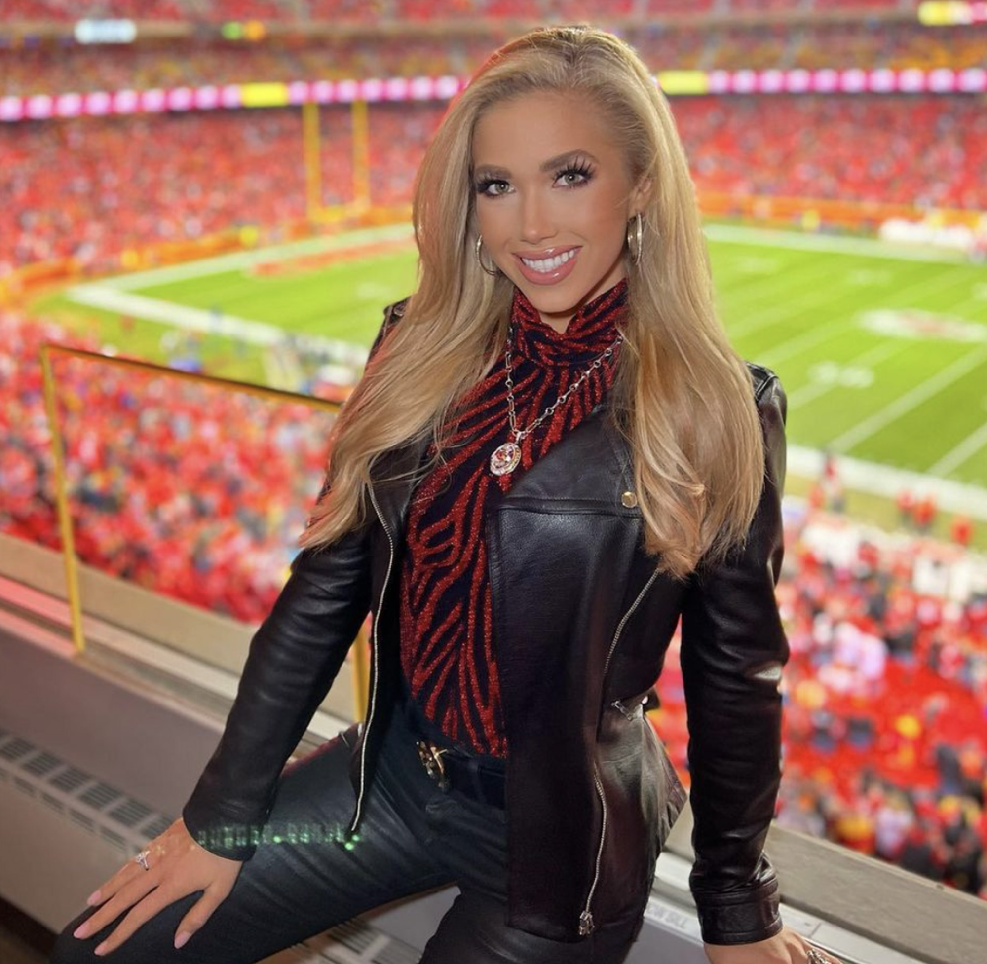 Gracie Hunt smiles from Arrowhead Stadium in Kansas City.