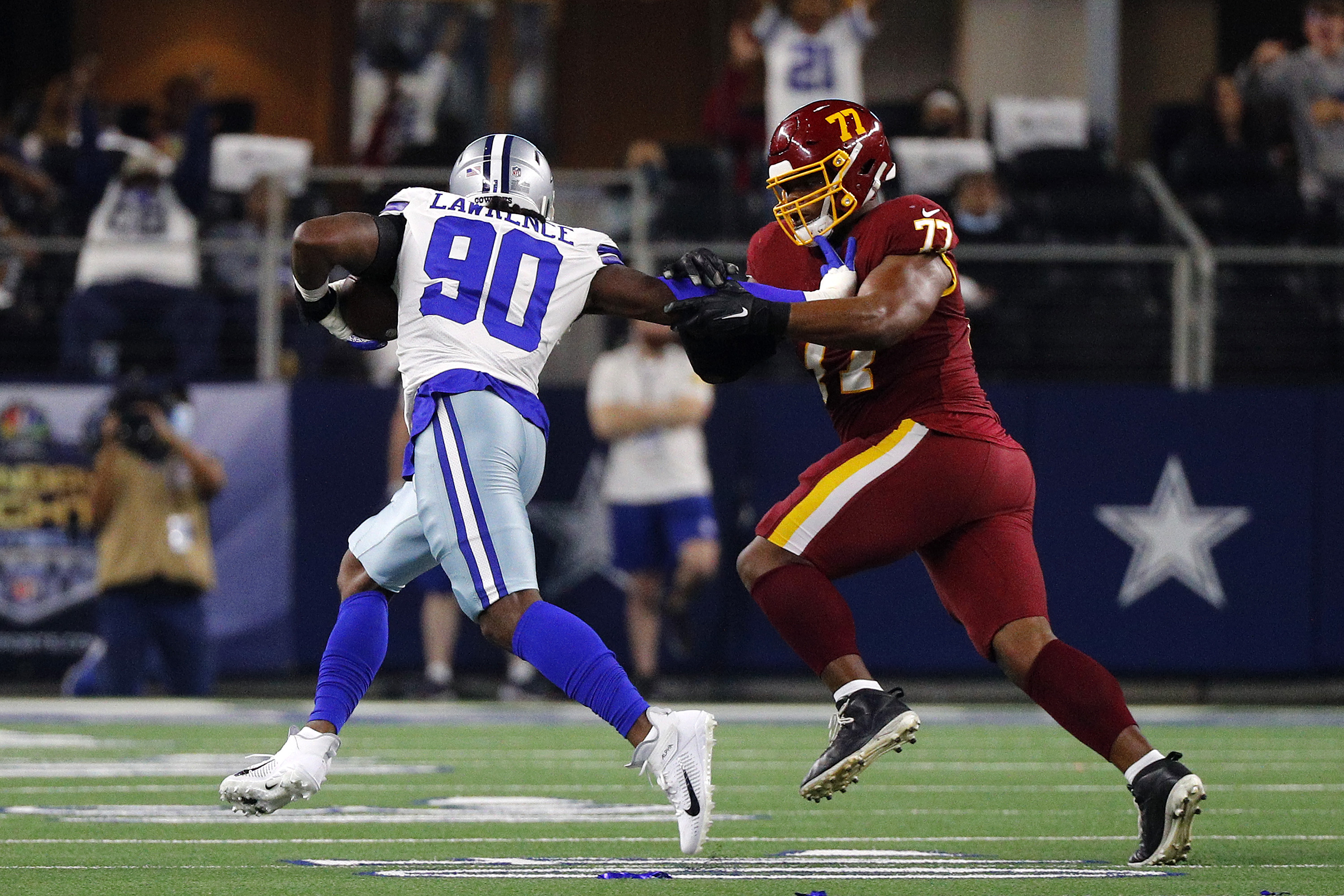 Demarcus Lawrence returns his interception for a touchdown.