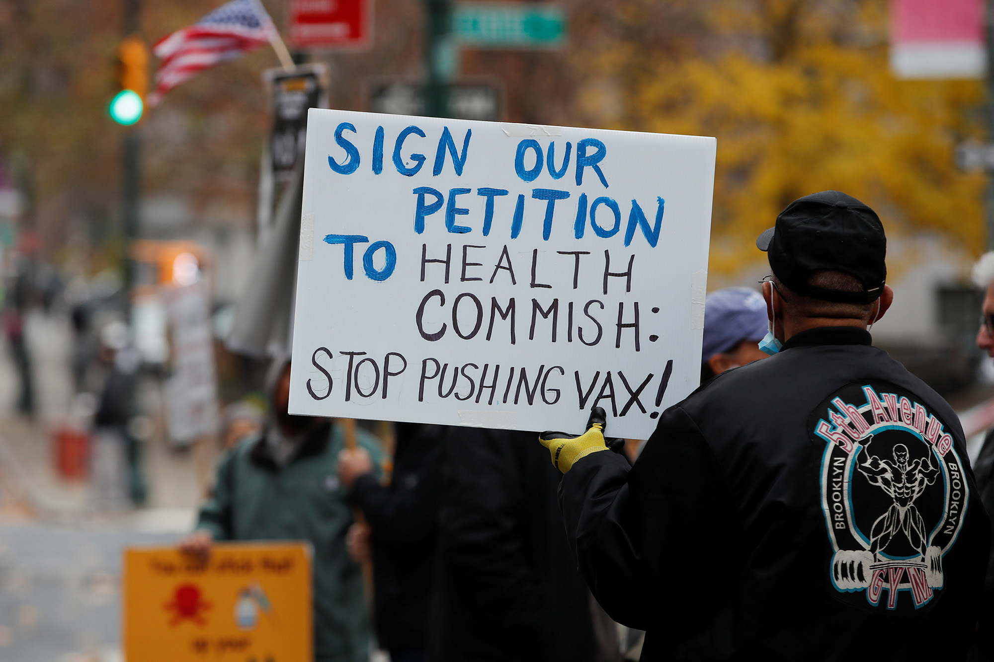 Protestors demonstrate outside the New York City Department of Health offices after New York City Mayor Bill de Blasio announced that all private-sector employers must implement COVID-19 vaccine mandates for their workers