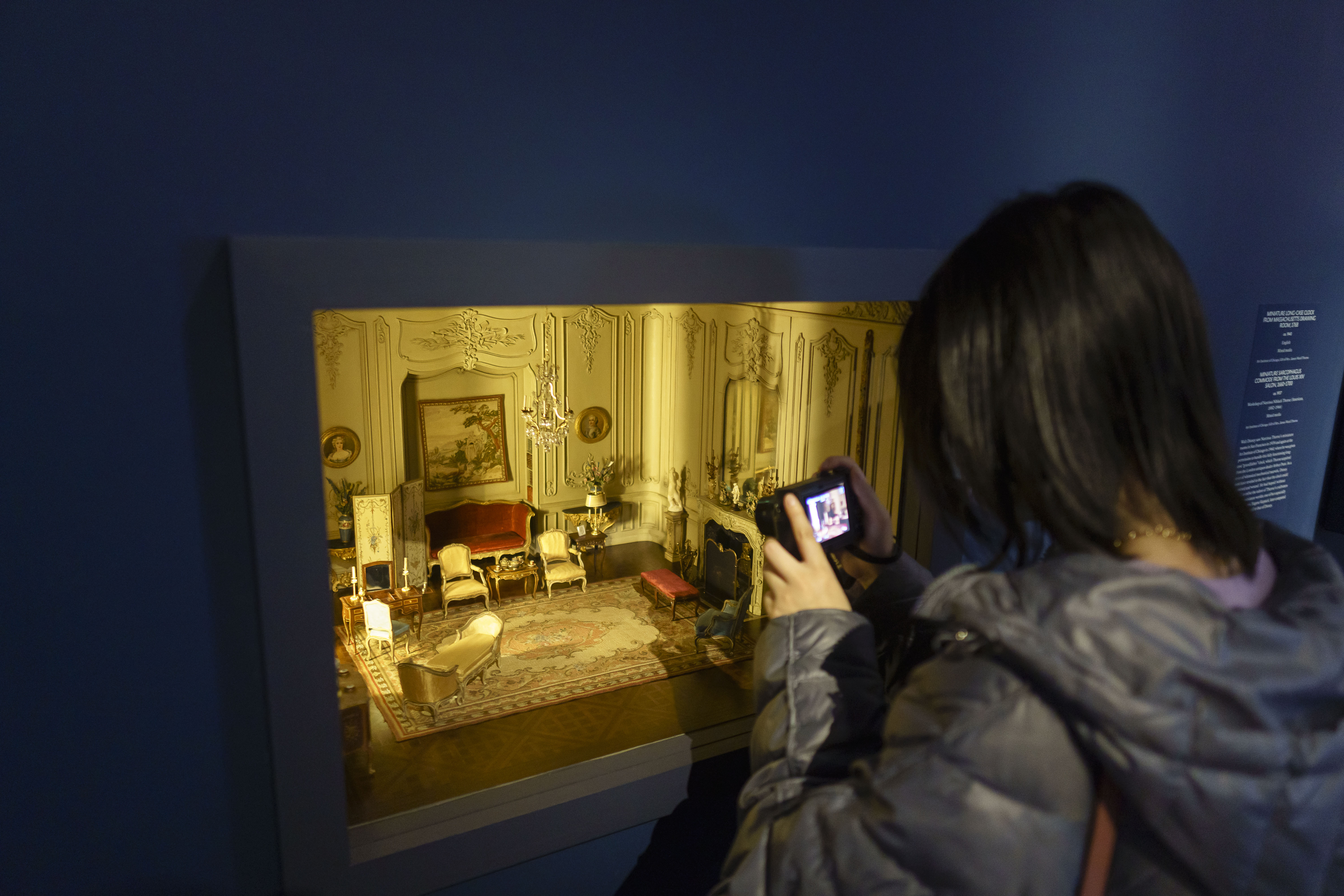 The miniature room is, in fact, small -- and an attraction that visitors have photographed.