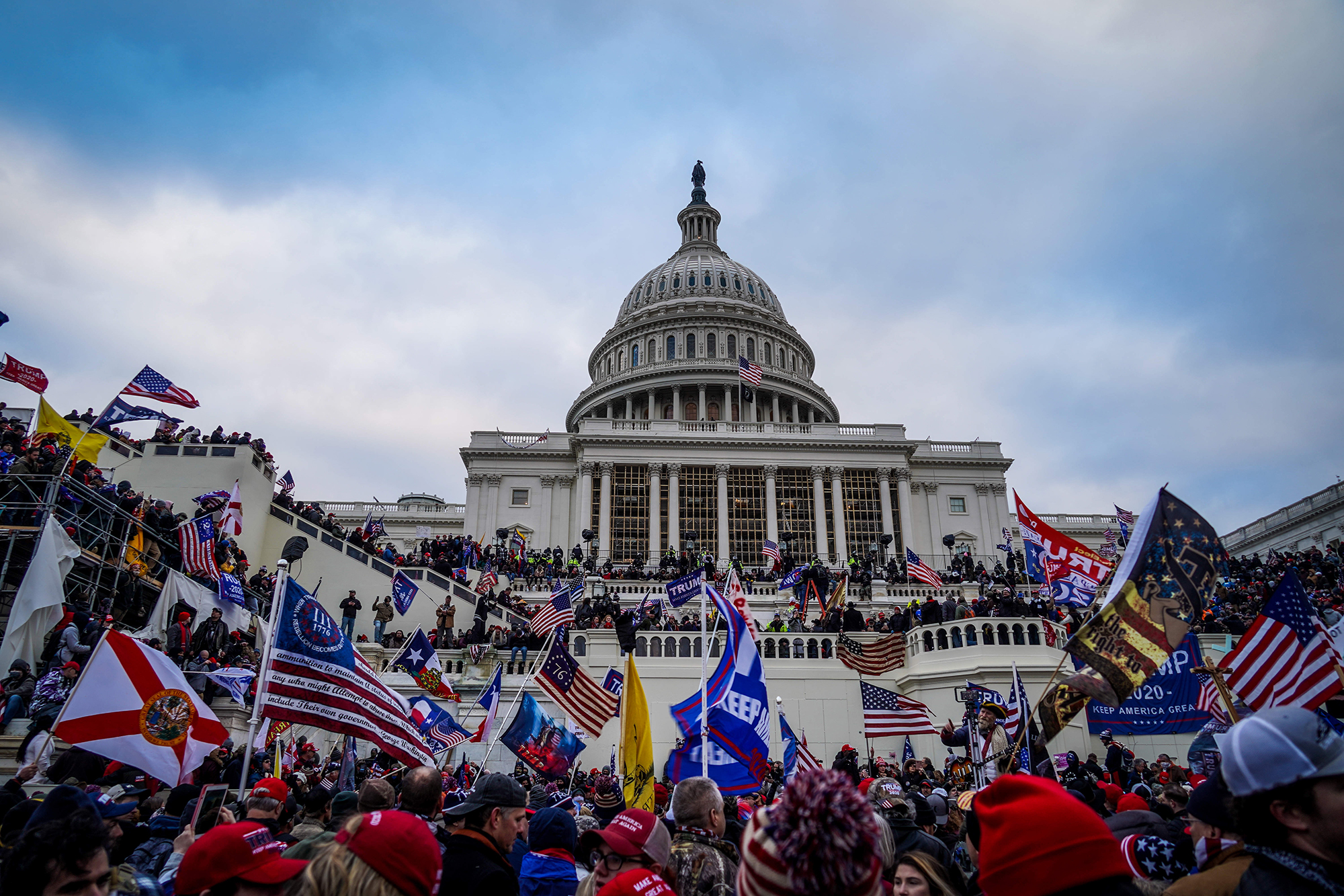 Trump supporters storm the US Capitol building to to protest the ratification of the then President-elect Joe Biden's Electoral College victory over President Trump in the 2020 election.