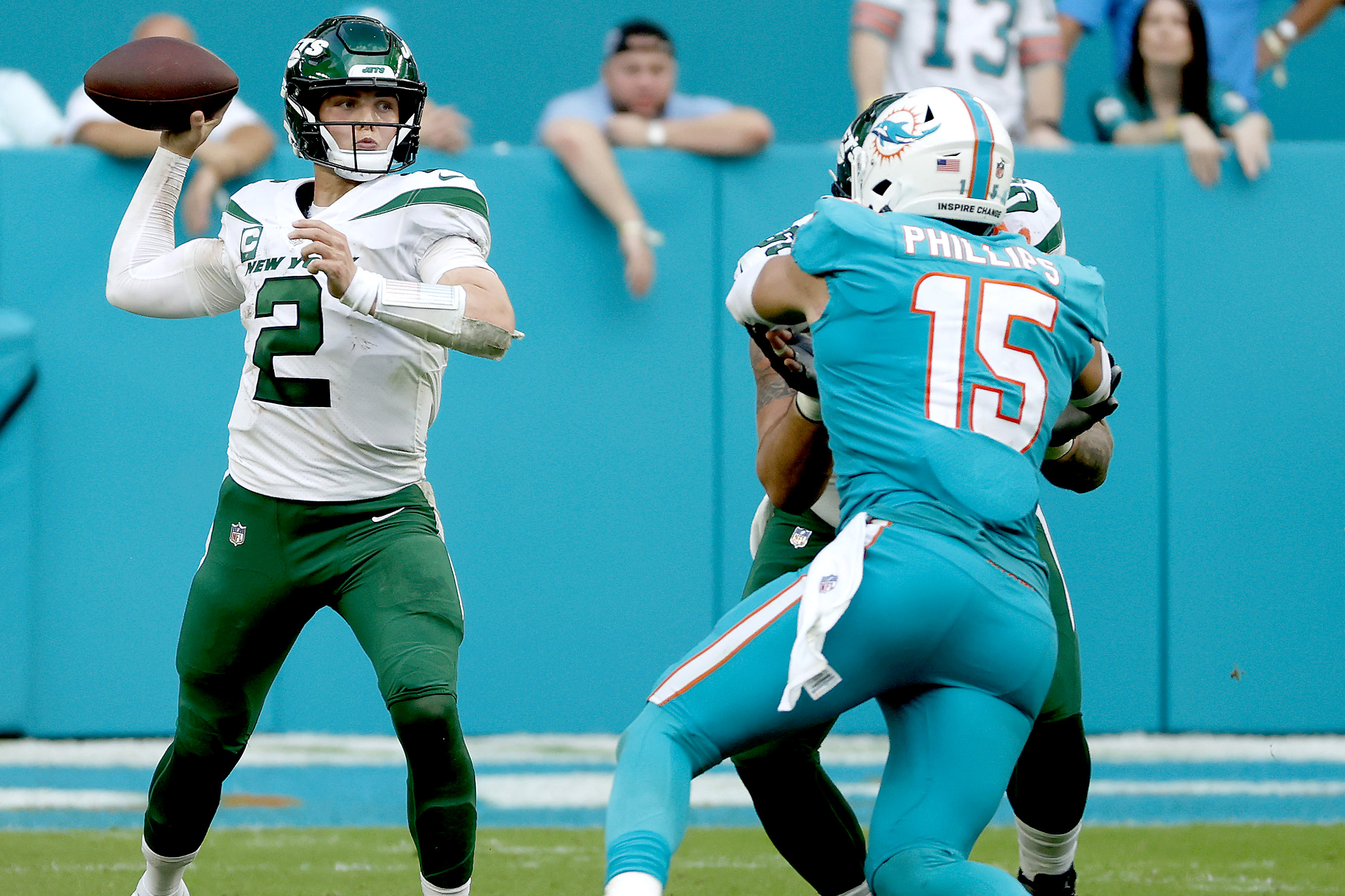 Zach Wilson throws a pass for the Jets against the Dolphins