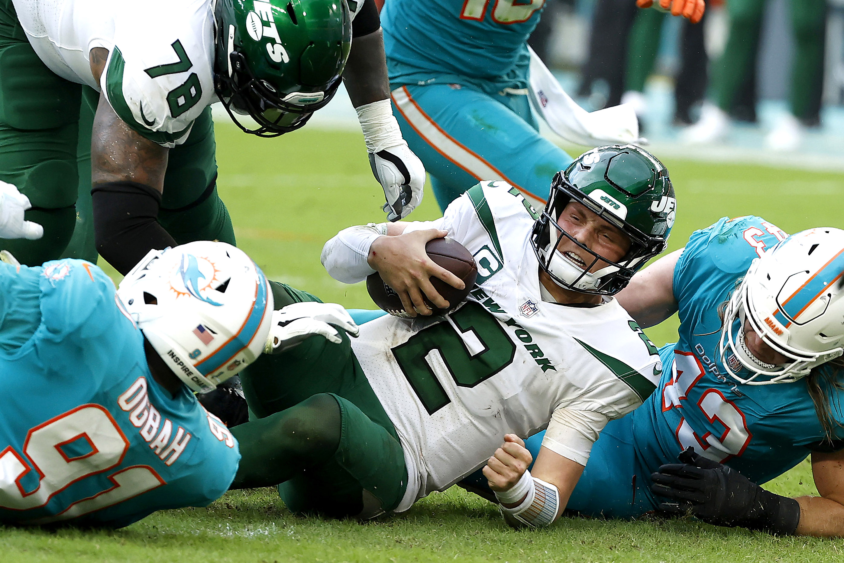 Zach Wilson gets sacked against the Dolphins