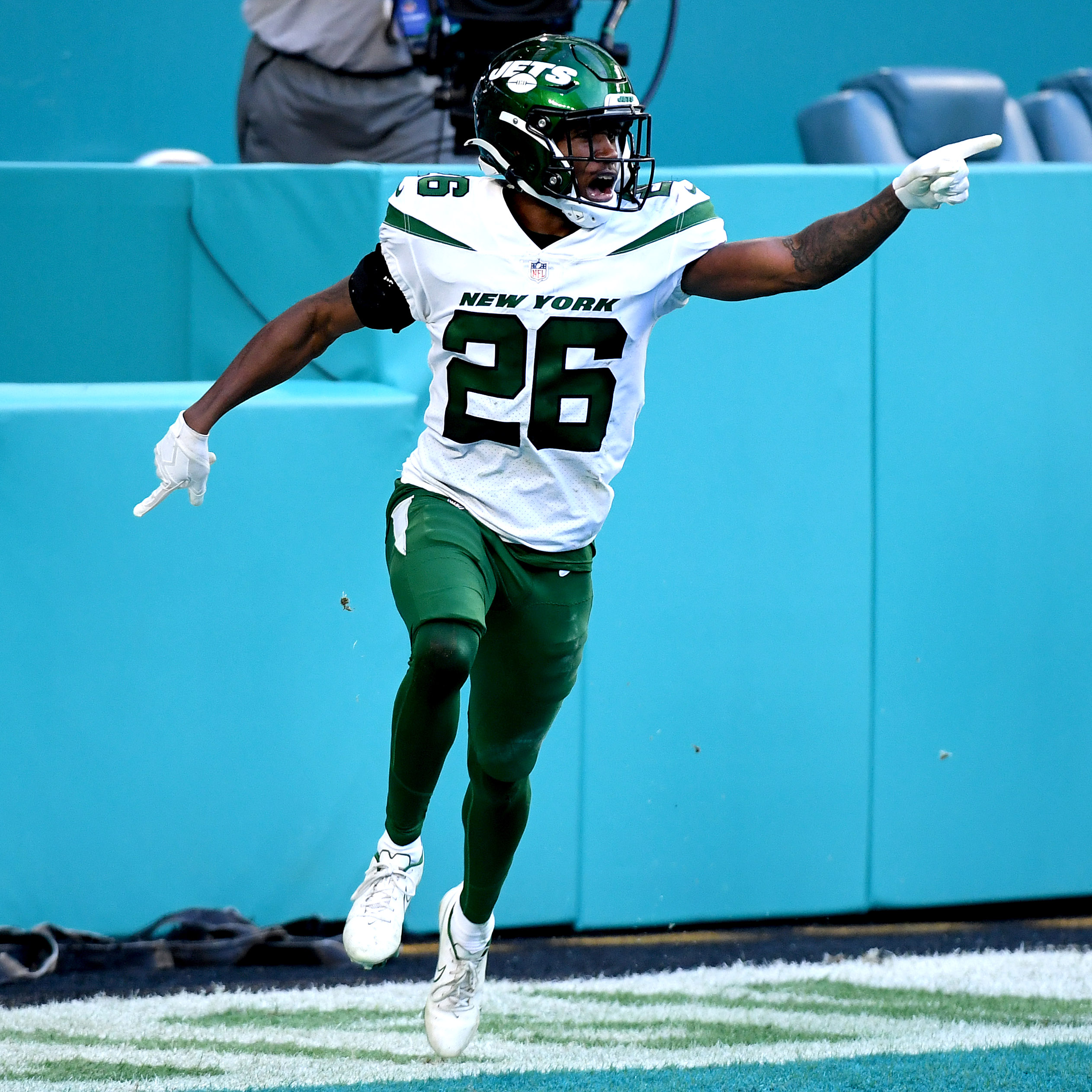 Brandin Echols celebrates his pick-six