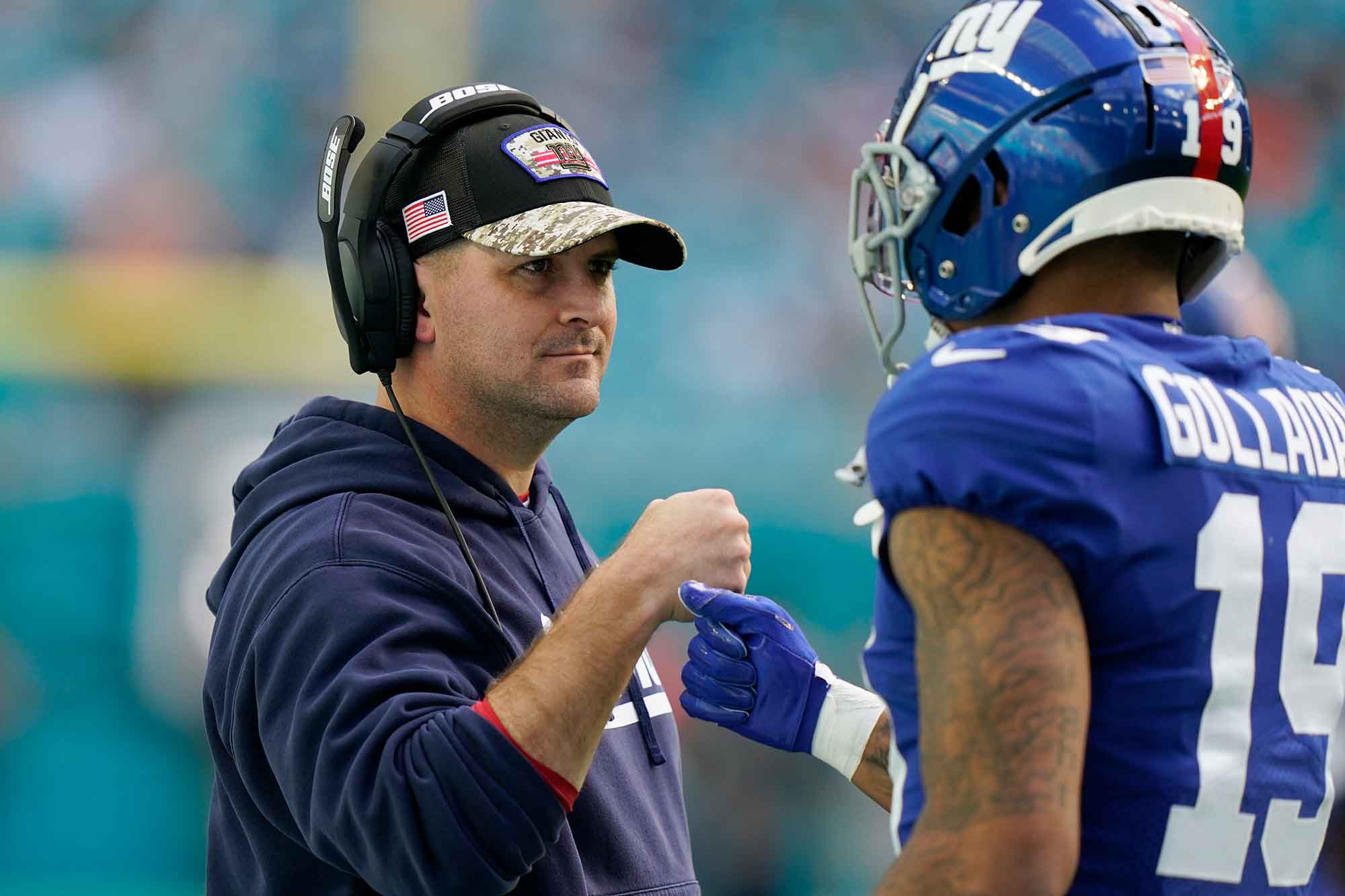 New York Giants head coach Joe Judge fist bumps wide receiver Kenny Golladay
