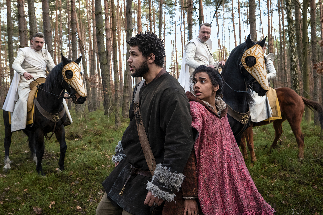 Perrin (Marcus Rutherford) and Egwene (Madeleine Madden) being captured by Whitecloaks in The Wheel of Time Episode 5
